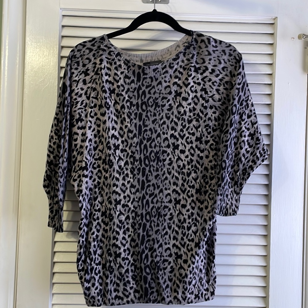 Black and white cheetah print sweater.